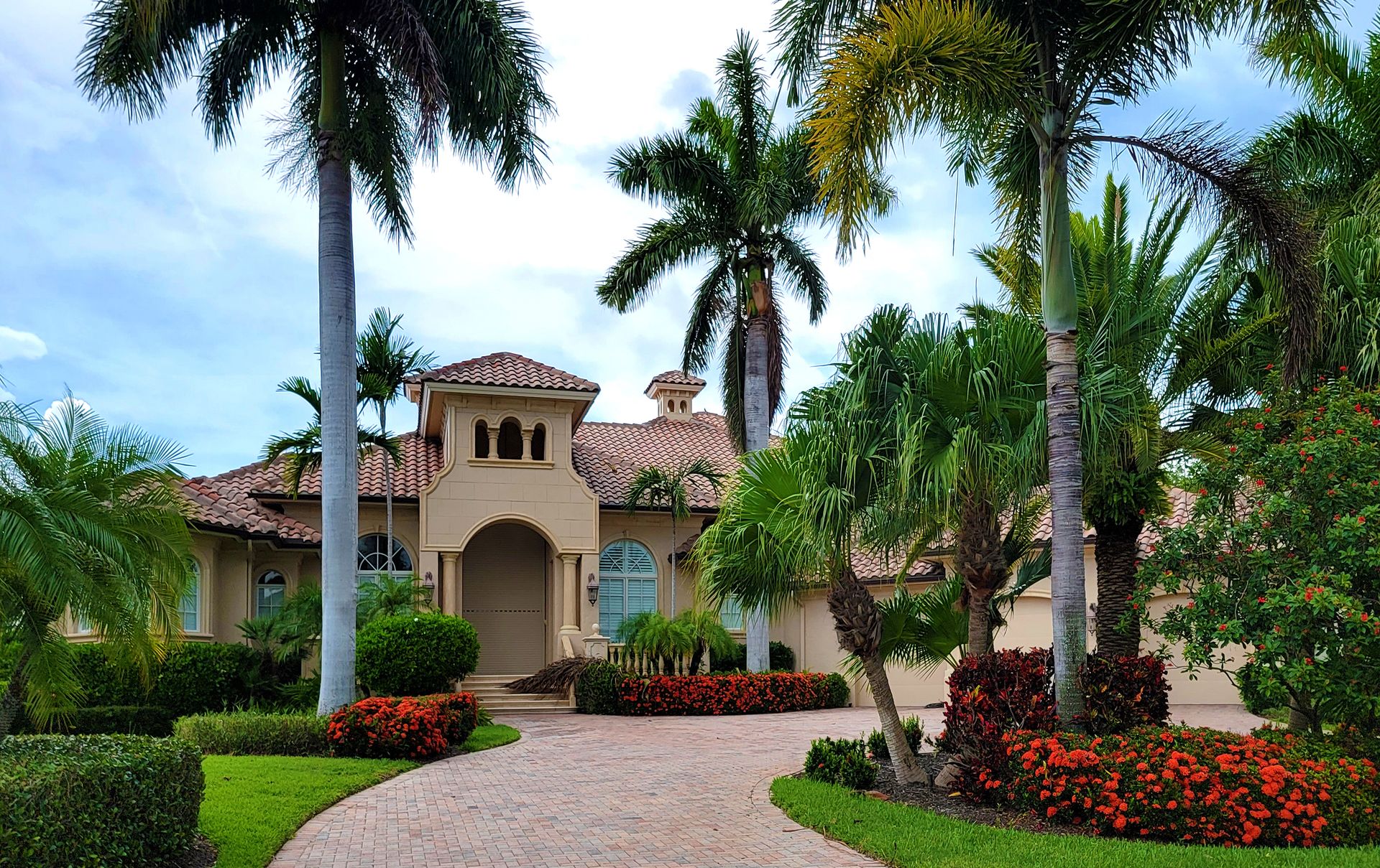 Manicured Baton Rouge lawn and landscaped beds at golden hour